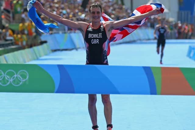 LEADING MAN: Alistair Brownlee celebrates as he crosses the finish line during the Men's Triathlon at Fort Copacabana in Rio back in 2016. Picture: Alex Livesey/Getty Images