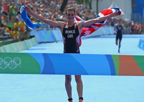 LEADING MAN: Alistair Brownlee celebrates as he crosses the finish line during the Men's Triathlon at Fort Copacabana in Rio back in 2016. Picture: Alex Livesey/Getty Images