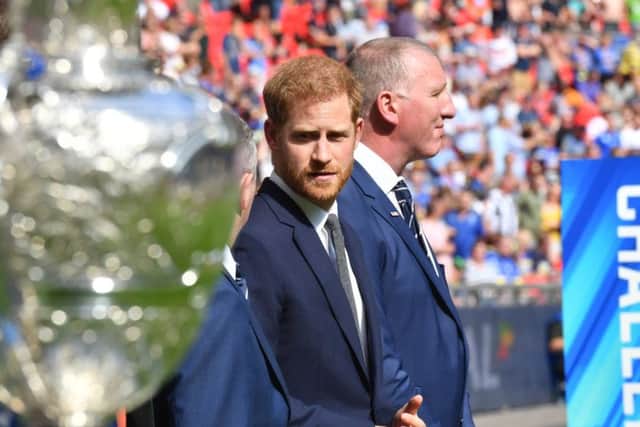 Prince Harry: RFL patron, pictured at the 2019 Challenge Cup final with RFL ceo Ralph Rimmer, is due to conduct the draw for the Rugby World Cup on Thursday. (Picture: Simon Wilkinson/SWpix.com)