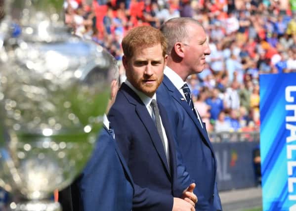 Prince Harry: RFL patron, pictured at the 2019 Challenge Cup final with RFL ceo Ralph Rimmer, is due to conduct the draw for the Rugby World Cup on Thursday. (Picture: Simon Wilkinson/SWpix.com)