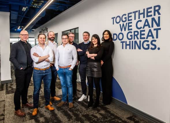 (Left to right: Andrew Brown Creative Strategy Director, Mark Rutherford Chief Financial Officer, Gary Smith Chief Operating Officer, Dan Hoggan Chief Technical Officer, Paul Mallet Managing Partner, Brett Jacobson Chief Executive Officer, Becca Tredget Head of Strategic Planning and Gill Ball Managing Partner.)