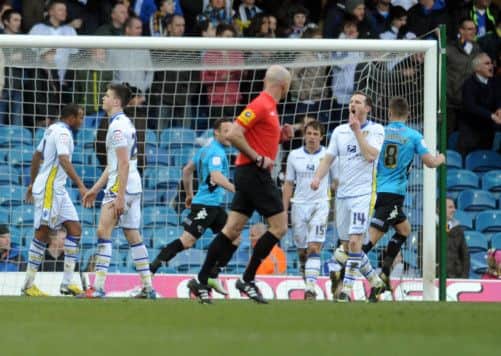 Leeds players dejected after Derby County gain the advantage with their second goal of the match.
