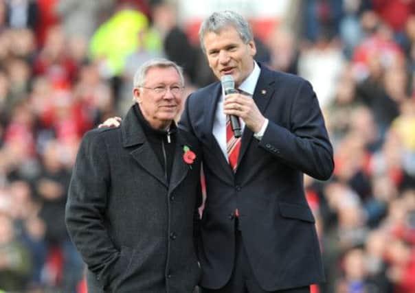 Manchester United manager Sir Alex Ferguson with chief executive David Gill. (Picture: Martin Rickett/PA Wire).