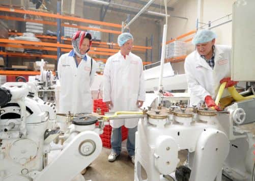 Princess Anne visits Candy Makers on Parkside Industrial Estate, Beeston, Leeds, with Rob Whittleston (MD) and Brian Siron (Director).