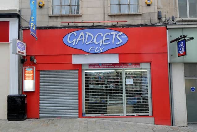 The shutters were down at Gadgets Fix after the police raid