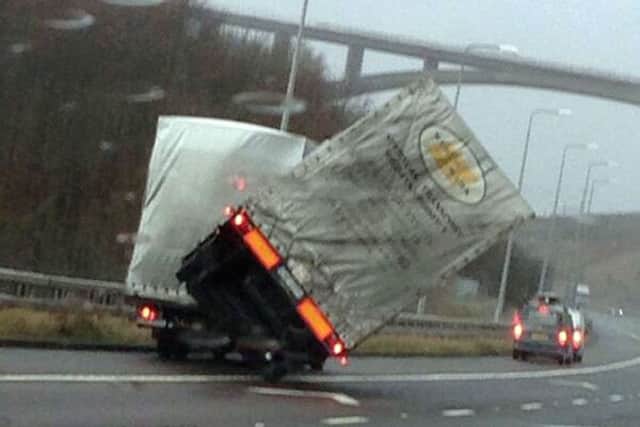 A lorry overturning on the M62  motorway at Scammoden water in West Yorkshire between Junction 22-23 Westbound. Picture: Colette Nuttall/PA Wire