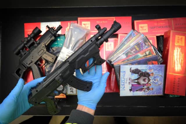 Border Forces seize Cigarettes, fake firearms and Compact discs at Leeds Bradford Airport....18th February 2014..SH/1001/139d....Picture By Simon Hulme