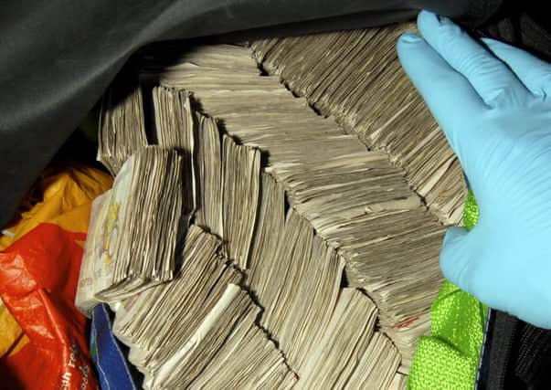 The cash stashed by Detective Constable Nicholas McFadden. Picture: Ross Parry Agency