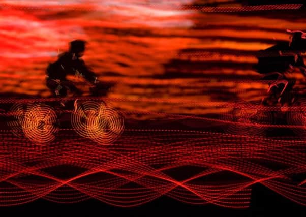 Riders taking part in the Ghost Peloton light show at Tetley's Waides Yard, in Leeds. Picture by Tim Smith