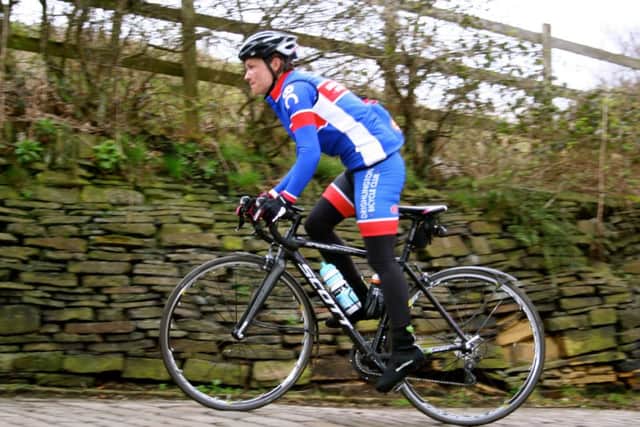 Drighlington Bicycle Club member Niki Kimber climbing Shibden Wall, in Halifax, during the Ronde Van Calderdale sportive. Picture by David Todd