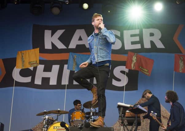 Ricky Wilson (centre) performs a surprise set with the Kaiser Chiefs, as the first act of the festival, at the Glastonbury Festival. PIC: PA