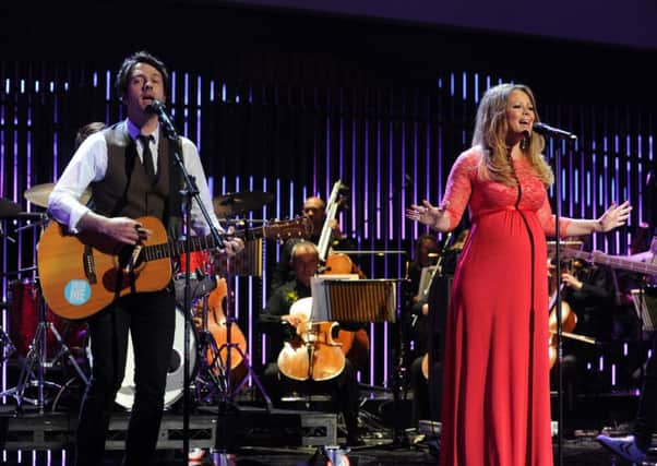 Alistair Griffin and Kimberley Walsh perform 'The Road' during the Tour de France Team Presentation Opening Ceremony, First Direct Arena, Leeds.
3 July 2014.  Picture Bruce Rollinson