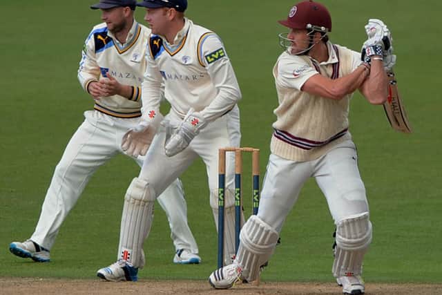 Somerset's Nick Compton dispatches this delivery from Yorkshire's Adil Rashid.
