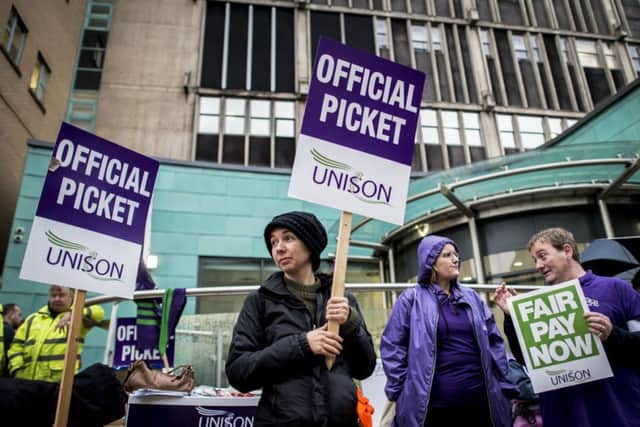 Hundreds of thousands of health workers have walked out on strike, many for the first time in their lives, in protest at the Government's decision not to give them a recommended pay rise.