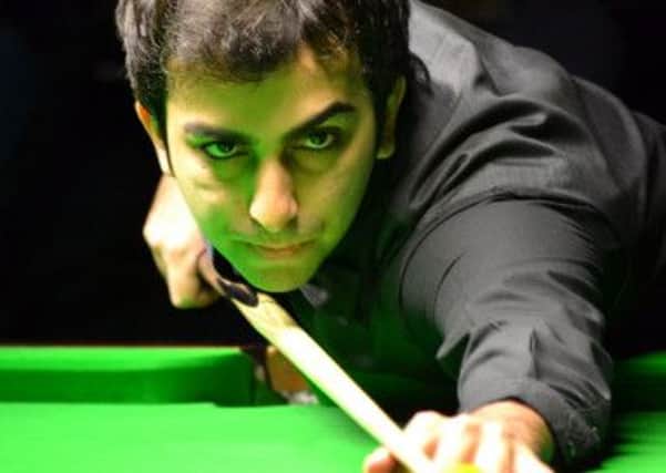 Pictured Pankaj Advani, from India, at action during the tournament.