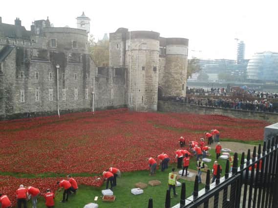 The poppies are now being removed from the Tower of London