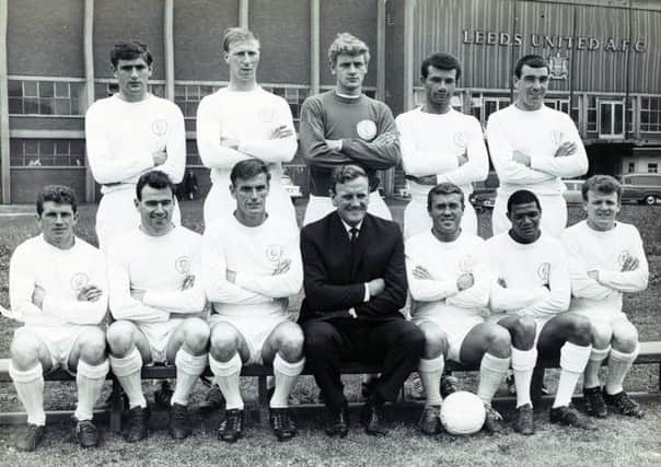 Jim Storrie (front row, second from left)