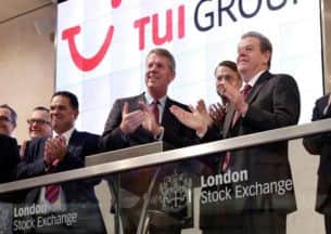 Joint chief executives Fritz Joussen and Peter Long at the opening market ceremony for TUI Group, following the completion of the merger.