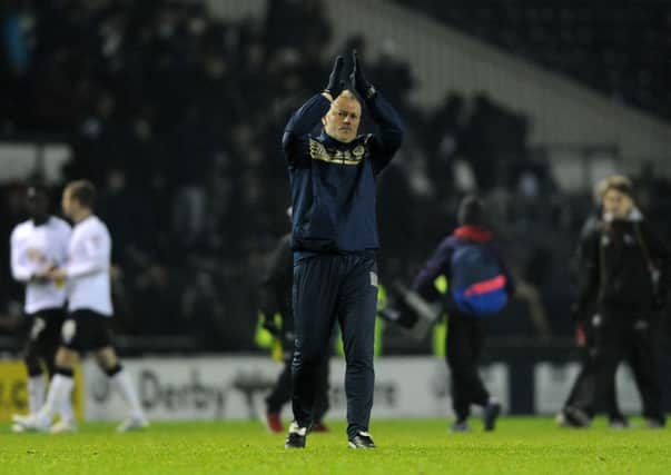 STICK WITH US: Neil Redfearn applauds the 2,236 Leeds fans who gave tremendous support in defeat Derby. Picture: Bruce Rollinson.