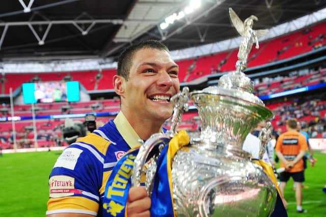 Leeds Rhinos' Ryan Hall with the Challenge Cup.