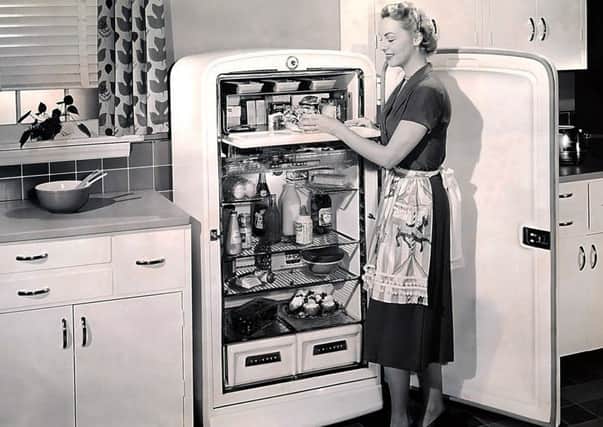 No Merchandising. Editorial Use Only. No Book Cover Usage

Mandatory Credit: Photo by Everett Collection/REX (506527a)

A woman with a Philco Refrigerator

ADVERTISEMENT FOR A PHILCO REFRIGERATOR - c 1951