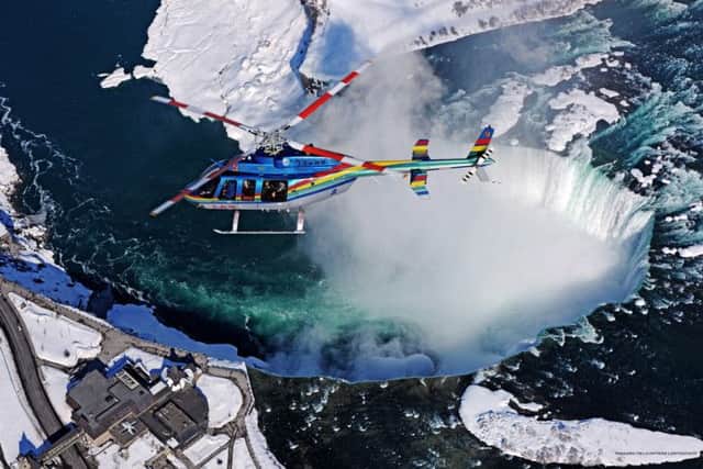 A helicopter ride is one way to see Niagara Falls