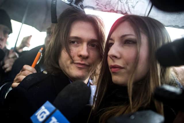 Raffaele Sollecito is flanked by his girlfriend Greta Menegaldo as he arrives at Italy's highest court building
