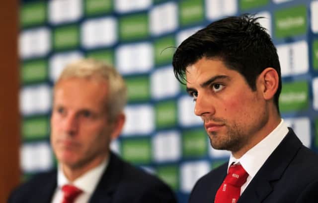England's captain Alastair Cook, (right) and coach Peter Moores, (left). (PA)