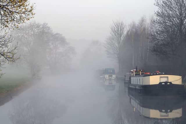 Early morning mist struggles to clear in the village of Rodley on what is expected to be the hottest day of the year.