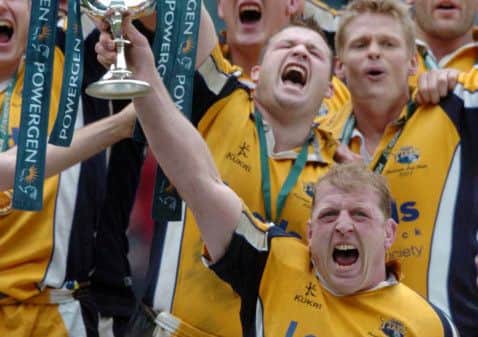 Powergen Cup Winners Leeds Tykes at Twickenham as captain Mike Shelley lifts the trophy.