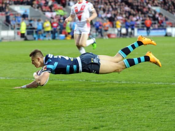 TREBLE HAUL: Ash Handley goes over for one of his three tries. Picture: Steve Riding.