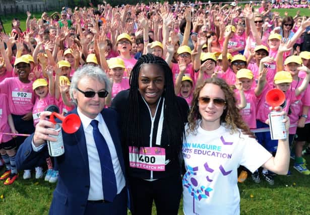 Don and Kerry Maguire start the race with Olympian Perri Shakes-Drayton. Picture: Jonathan Gawthorpe.