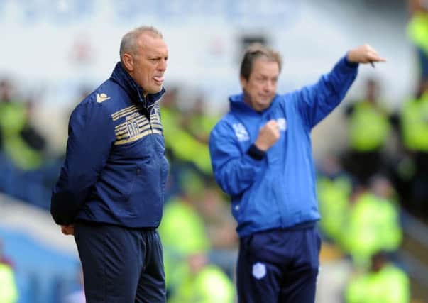 Neil Redfearn and Stuart Gray on the touchline.