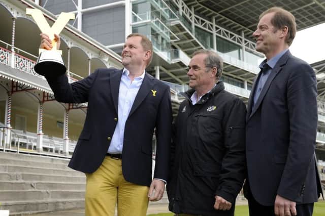 Opening of the Tour de Yorkshire Media Centre  at York Racecourse, pictured with the winners trophy are Gary Verity, Chief Executive of Welcome to Yorkshire, Bernard Hinault  5 times winner of the Tour de France, and Christian Prudhomme: Director of Tour de France, ASO.  30 April 2015.  Picture Bruce Rollinson