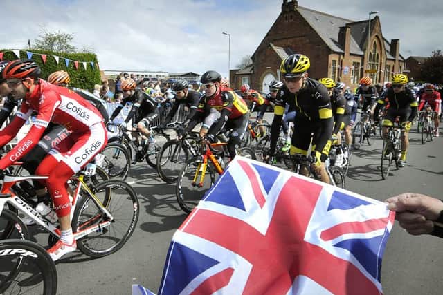 Tour de Yorkshire . The bikes race through Cayton. pic Richard Ponter 151725a