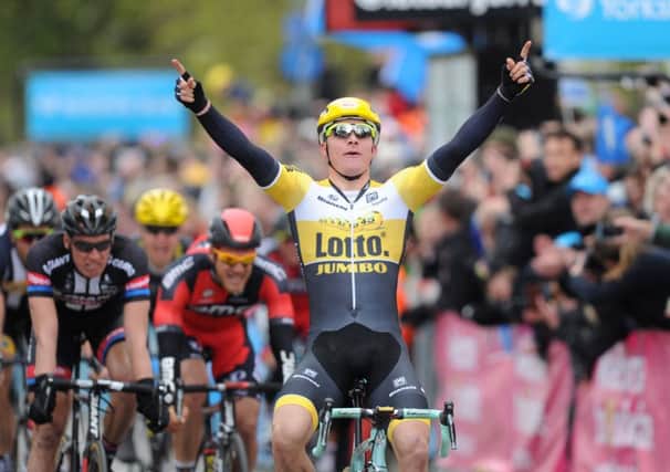 Team LottoNL-Jumbo's Moreno Hofland crosses the line first to win the stage  in York during the Tour de Yorkshire between Selby and York.