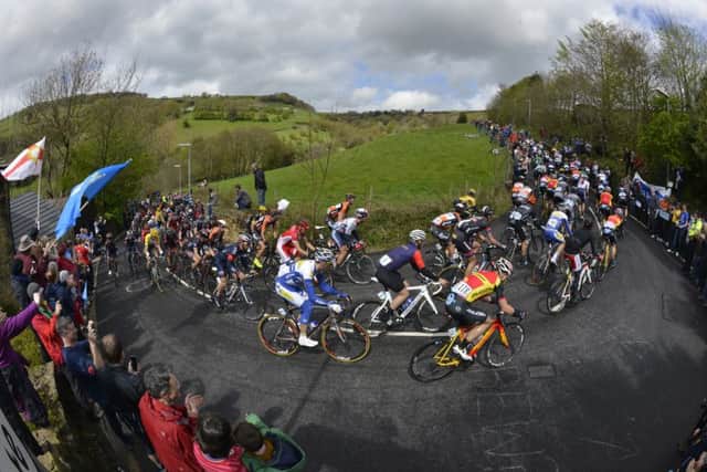 The peloton makes its way up Scapegoat  Hill out of Slaithwaite. PIC: Bruce Rollinson