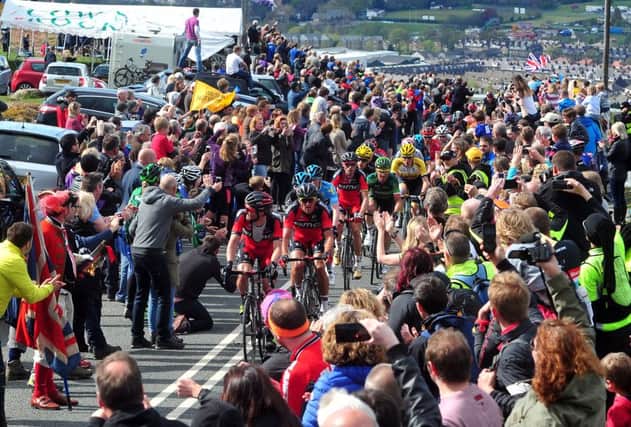 The Tour de Yorkshire peloton makes its way through the crowds on the Cow and Calf in Ilkley on Stage 3. PIC:  Tony Johnson
