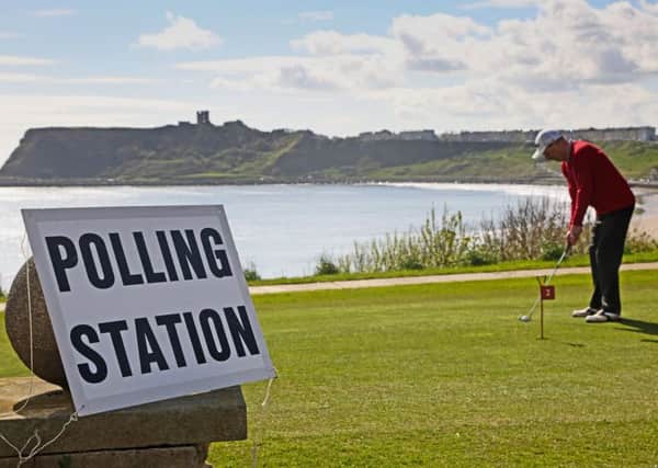 Is this Britain's most picturesque polling station? North Cliff Golf Club on Burniston Road in Scarborough overlooks the famous Scarborough castle and the North Bay providing a beautiful backdrop for golfers and voters who shared the club today