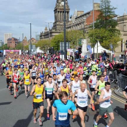 The Leeds Half Marathon, runners set off by Leeds Town Hall...SH1004040l 10th May 2015...Picture by Simon Hulme