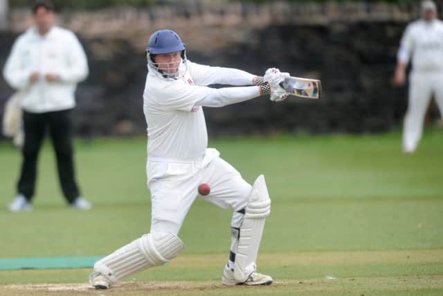 Cleckheaton's Richard Whitehurst hits out against Farsley in the Bradford League encounter. Picture: Steve Riding.