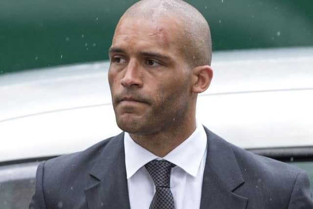 Ex-footballer Clarke Carlisle arrives for sentencing at Highbury Magistrates Court in London after he pleaded guilty to a drink-driving charge.