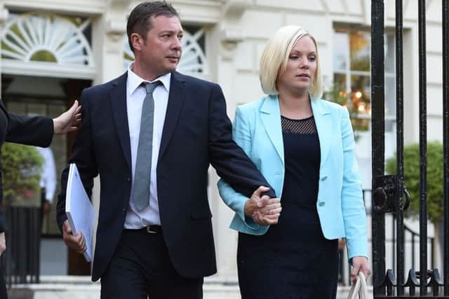 Neil and Ruth Shepherd leave after attending a press conference  in London