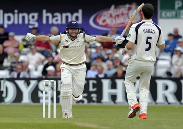 Jonny Bairstow celebrates his century off a James Harris delivery. Picture: Bruce Rollinson