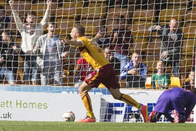 Motherwell's Lee Erwin celebrates his goal during the Scottish Premiership match at Fir Park, Motherwell.