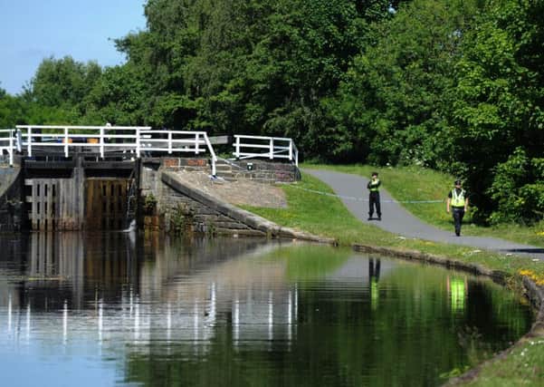Police at the scene on the Leeds Liverpool canal near Armley. Picture: Jonathan Gawthorpe