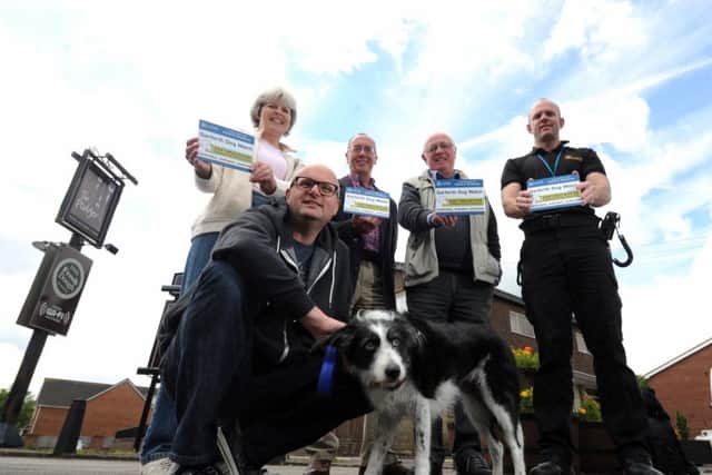 The Garforth Dog Watch Schem was launched at the Podger pub on Monday. Pictured is Coun Mark Dobson with Sally the Dog, and Sue Lomas, Eric Gale, Cliff Norcliffe, and dog warden Gavin Jarrett.
Picture: Simon Hulme