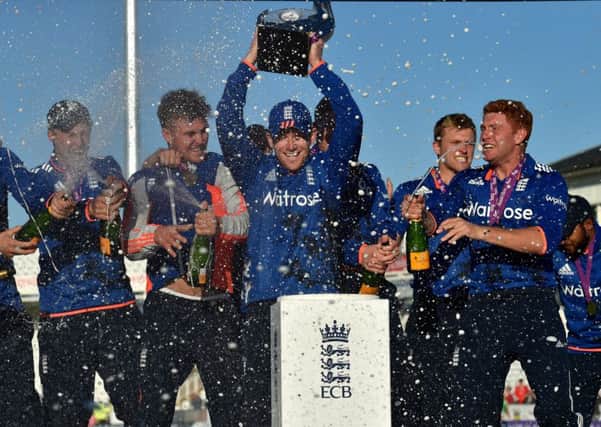 England's Eoin Morgan lifts the  Royal London One-Day Internatioal trophy after victory over New Zealand at The Emirates Durham ICG (Picture:Owen Humphreys/PA Wire).