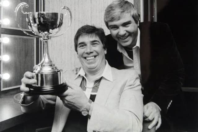 Singer Gene Pitney (right) presenting Club of the year award to Derek Smith at the Frontier Club Batley.
Dated May 7, 1985