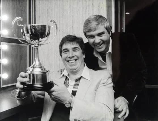 Singer Gene Pitney (right) presenting Club of the year award to Derek Smith at the Frontier Club Batley.
Dated May 7, 1985
